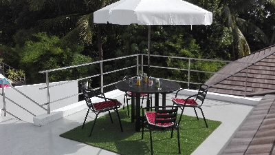 Villa Paris, view of the terrace from the top on the countryside and the sea in the background.